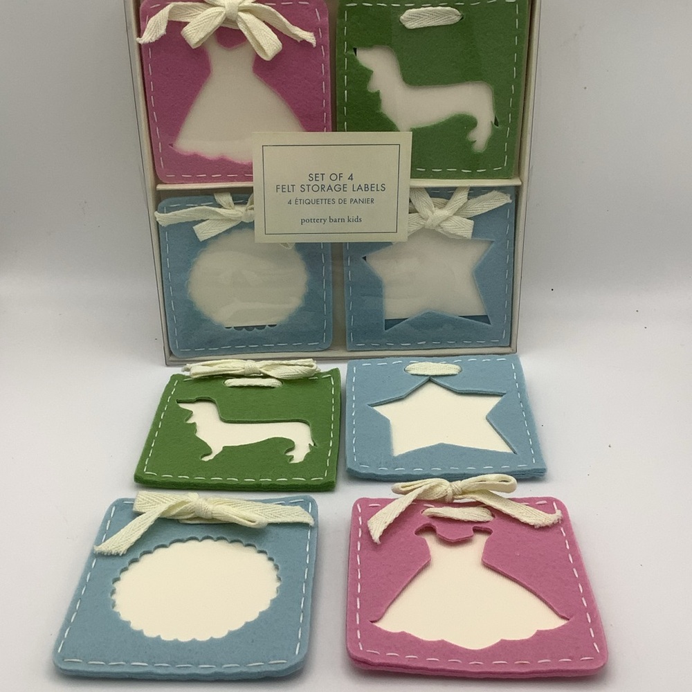 Two sets of Pottery Barn Kids Felt Storage Labels in Pink, Green, and Blue